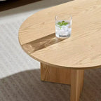 Table basse ovale moderne 39L, petite table d'appoint avec base piédestal robuste, taille compacte pour appartement, salon et chambre à coucher