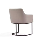Chaise de salle à manger moderne capitonnée en similicuir avec accoudoirs